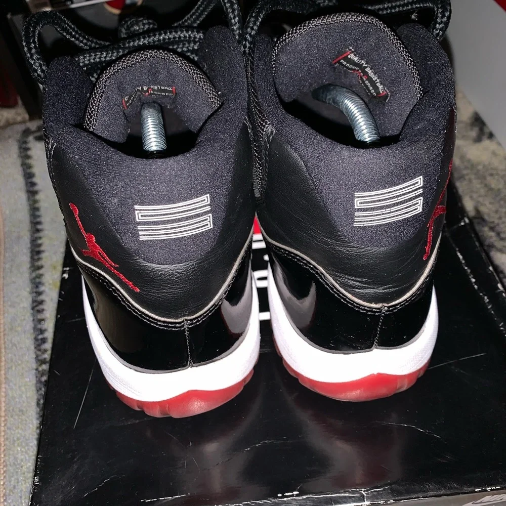 Jordan Men's Black and Red Retro 11 Sneakers